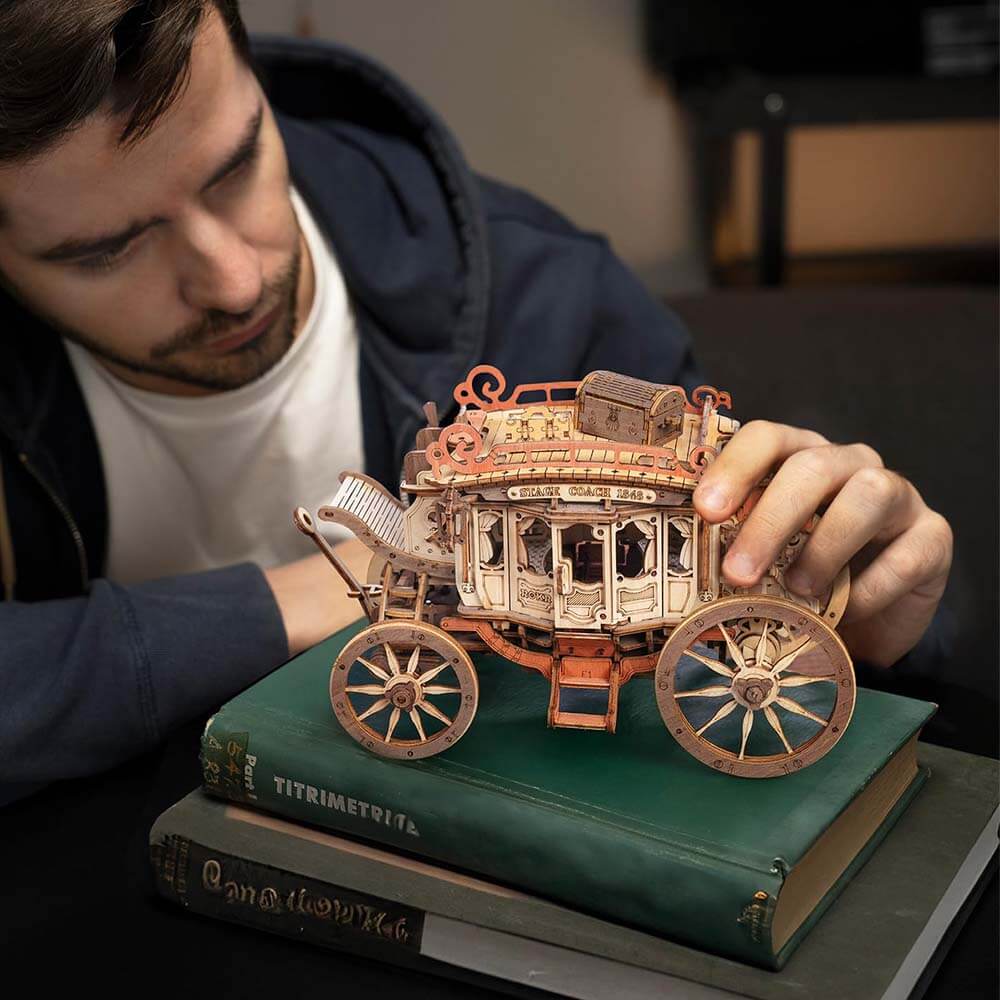 Stagecoach Mechanical Music Box — Beige/Brown Laser-Cut Wood, Wind-Up, Squirrel Figure